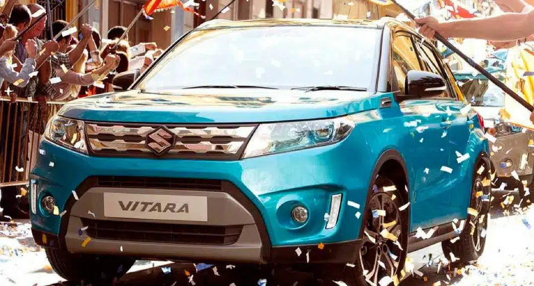 Suzuki Vitara in the street surrounded by confetti