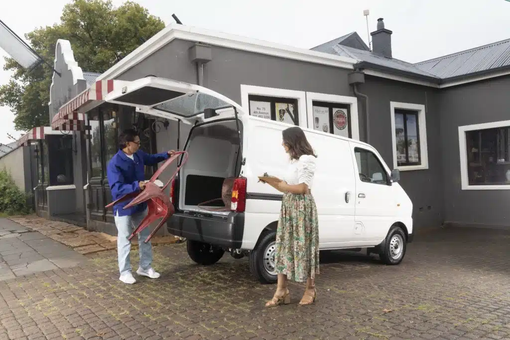 Suzuki Eeco being loaded from the back