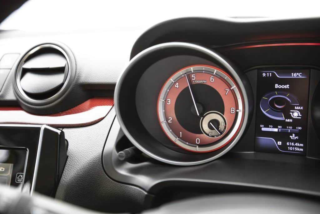 Dashboard of Suzuki Swift Sport, focusing on a RPM gauge